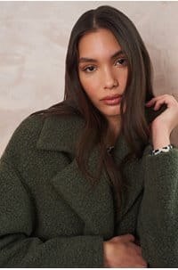 dropped shoulder coat in mossy green