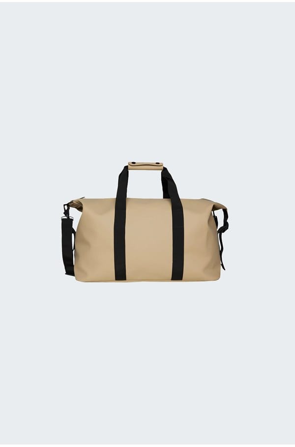 weekend bag in sand