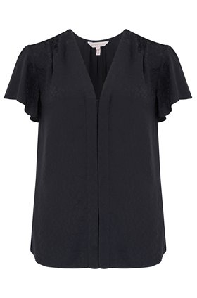 sleeveless cheetah jacquard top in black